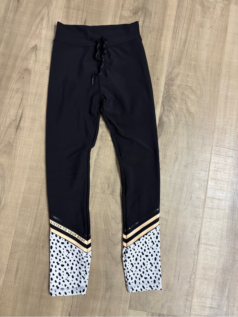 White Fox Boutique Black Leggings with Dalmatian Spot Hem and Tan Stripe
